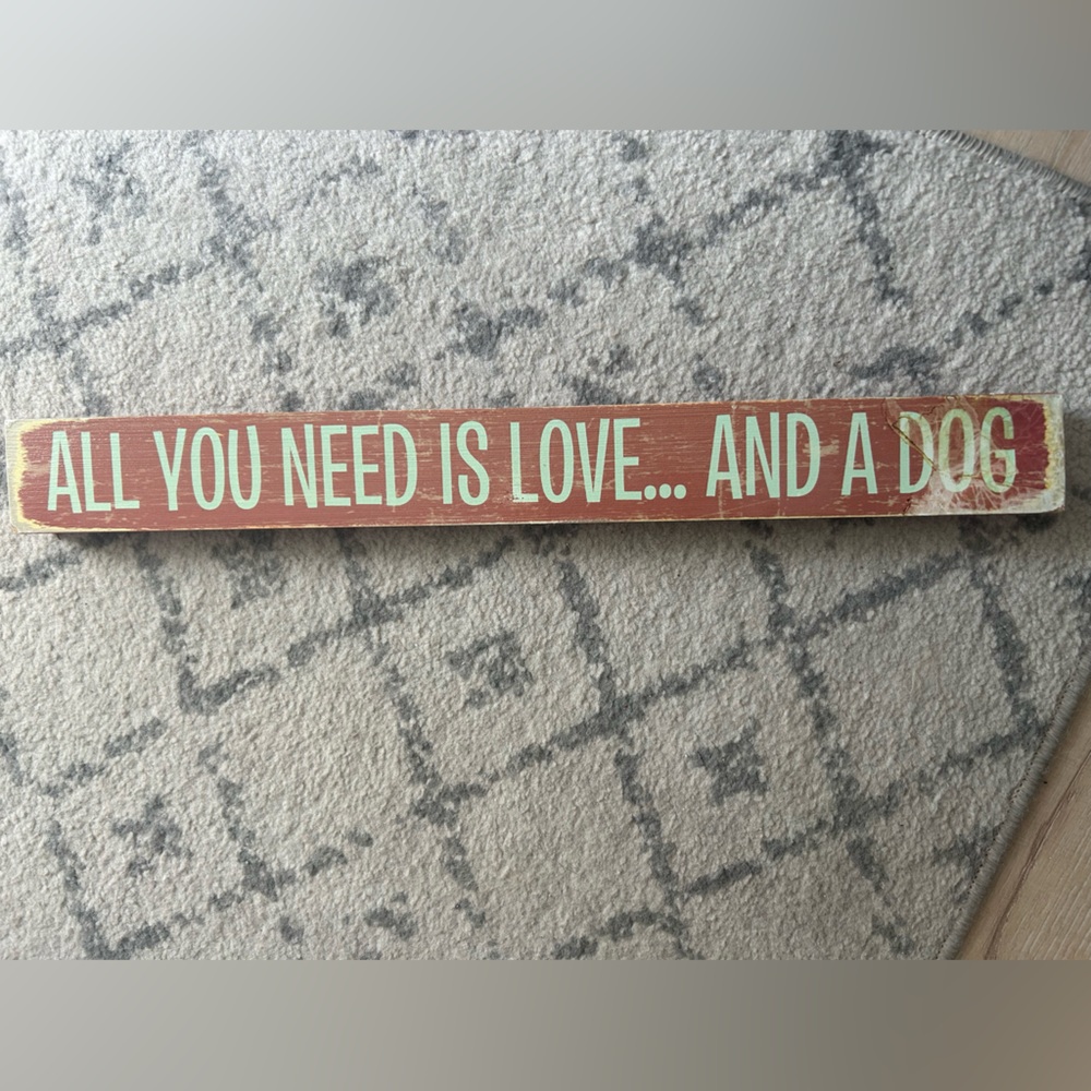“All you need is love and a dog” distressed wooden quote sign